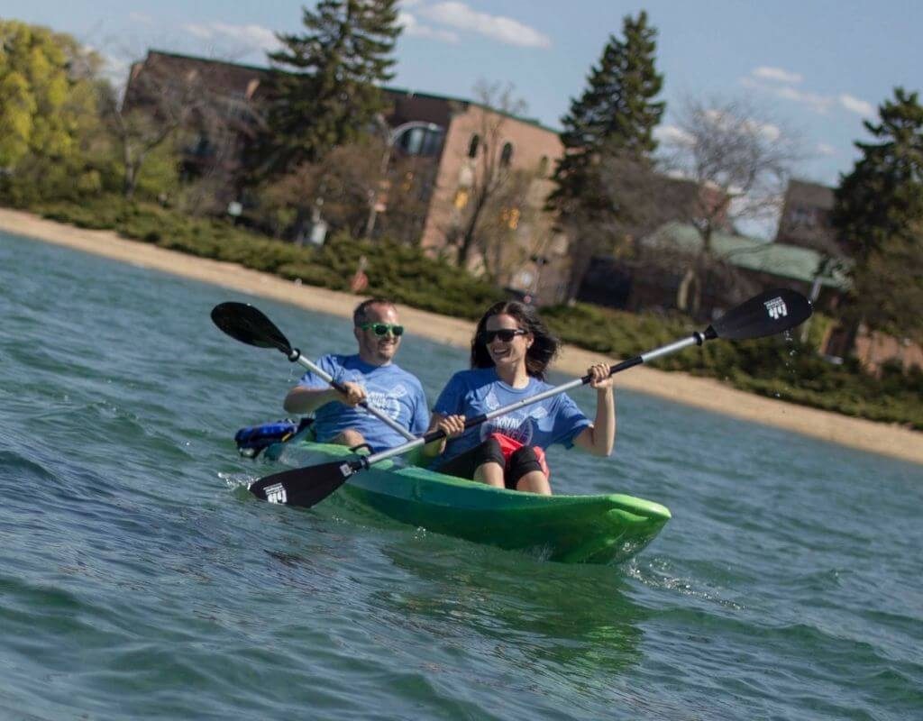 Couple on their kayaking adventure having a really good time